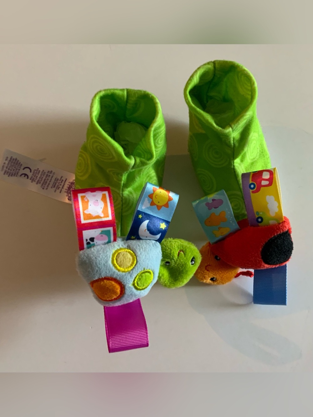 Taggies Bright Green Plush Baby Booties with Colorful Toy Tabs